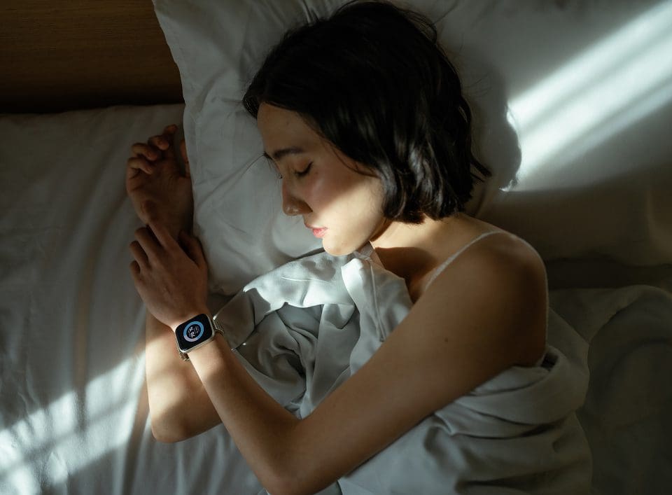 Person peacefully resting in bed